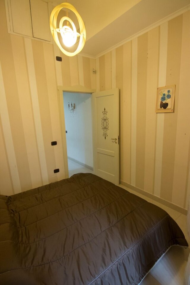 ビナリオ 9 エ トレ クァルティ