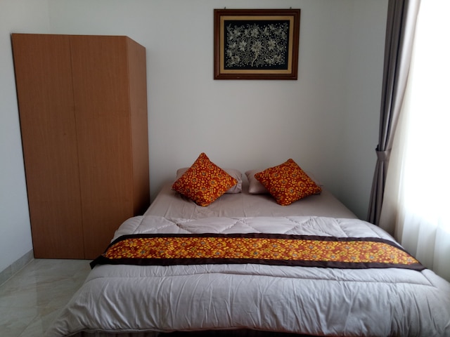 T ルームズ ホームステイ