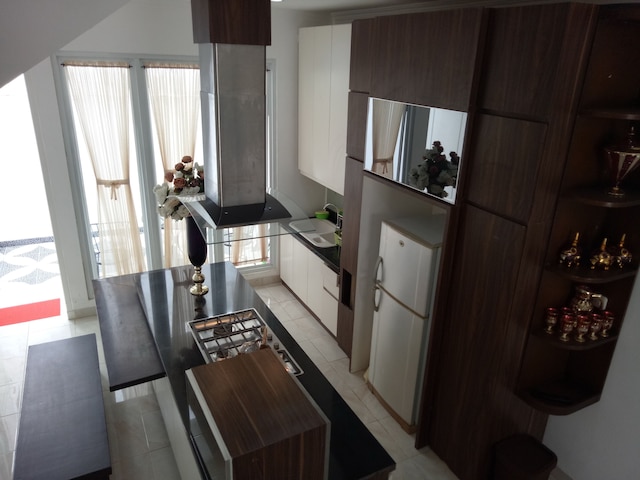 T ルームズ ホームステイ