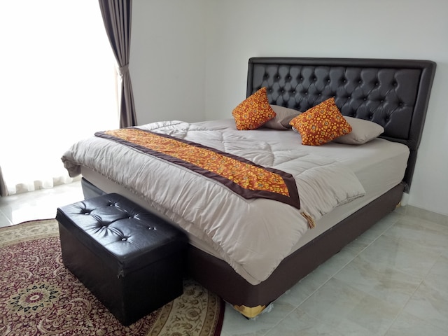 T ルームズ ホームステイ