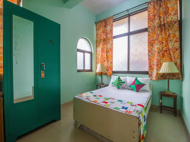 OYO 15934 ホーム トラディショナル 3BHK ベイングイニム