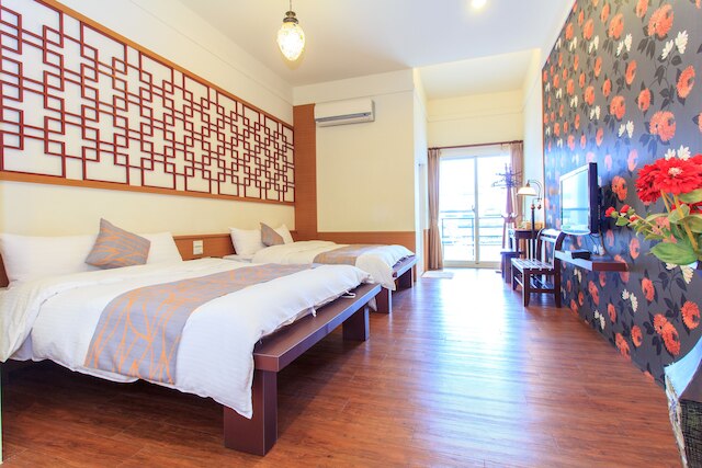 ロータス ホステル ベイチュン ジュアン (北成庄莲花荷畔渡假民宿)