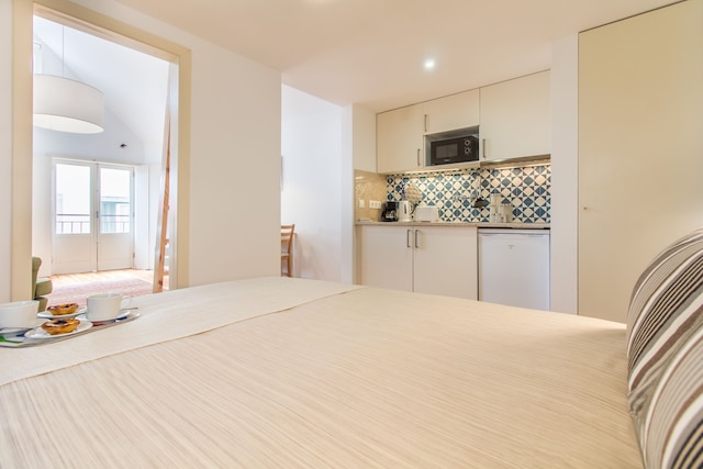 ゲスト イン アルファマ アパートメンツ