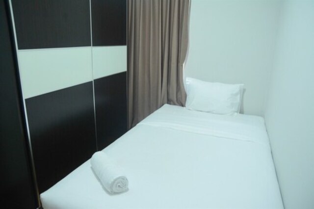 タムリン シティ モールの近くにある快適なコスモ レジデンス アパートメント、ベッドルーム 2 室