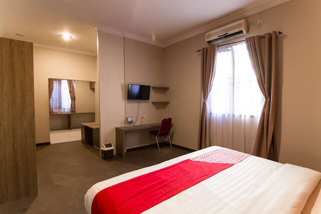 OYO 889 エドテル アマナ ホテル シャリア、Smk ムハマディヤ 1