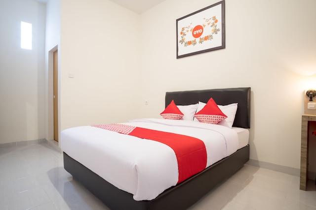 キャピタル O 873 カマニ ホームステイ シャリア