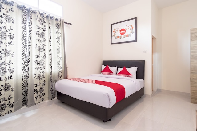 キャピタル O 873 カマニ ホームステイ シャリア