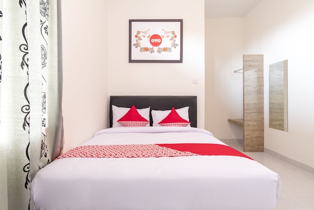 キャピタル O 873 カマニ ホームステイ シャリア