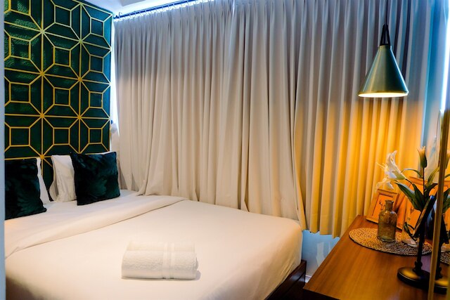 モダンでスタイリッシュなパクブウォノ テラス アパートメント、ベッドルーム 2 室