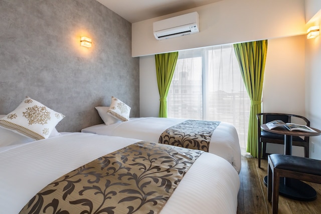 Mr.KINJO 万座ビーチ前