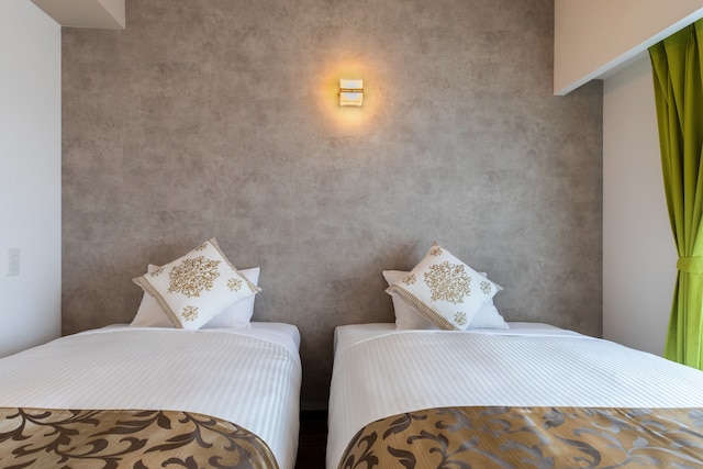 Mr.KINJO 万座ビーチ前