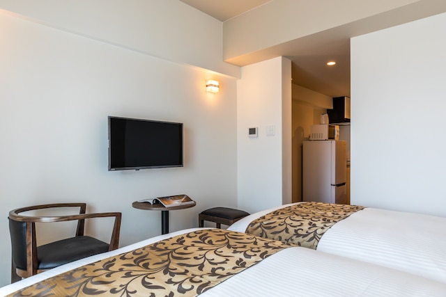 Mr.KINJO 万座ビーチ前