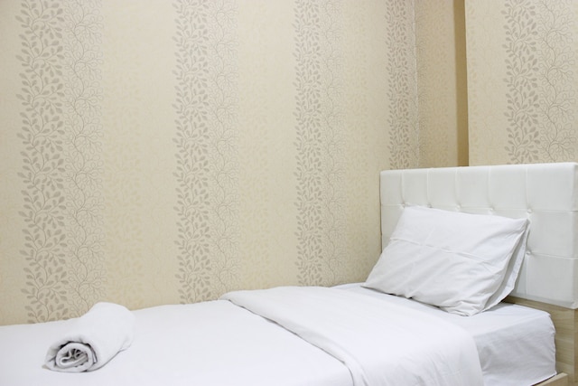 ムカルワンギ スクエア チバドゥユのクラシックなベッドルーム 2 室付きのアパートメント