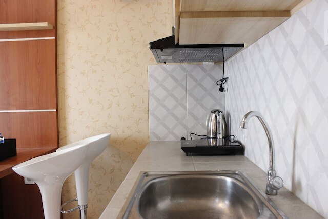 ムカルワンギ スクエア チバドゥユのクラシックなベッドルーム 2 室付きのアパートメント