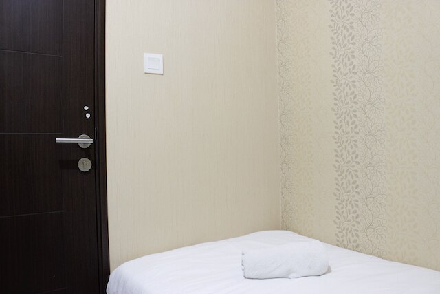 ムカルワンギ スクエア チバドゥユのクラシックなベッドルーム 2 室付きのアパートメント