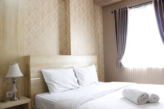 ムカルワンギ スクエア チバドゥユのクラシックなベッドルーム 2 室付きのアパートメント