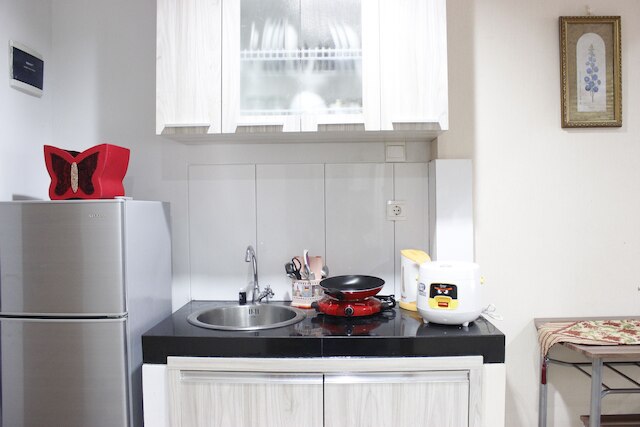 ダゴ スイーツ アパートメントにある ITB 大学近くのスタイリッシュなベッドルーム 1 室