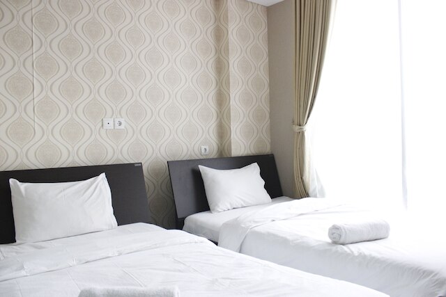 ダゴ スイーツ アパートメントにある ITB 大学近くのスタイリッシュなベッドルーム 1 室