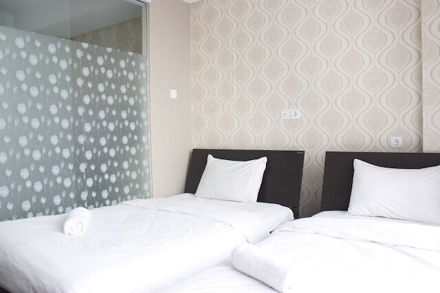 ダゴ スイーツ アパートメントにある ITB 大学近くのスタイリッシュなベッドルーム 1 室