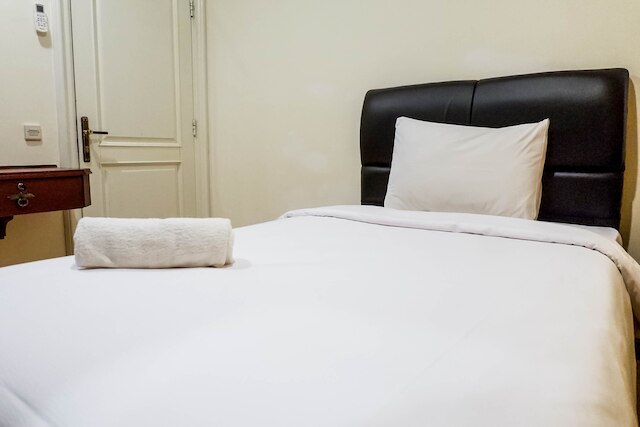 タマン ベバリー アパートメントにある広々とした高層階のベッドルーム 2 室