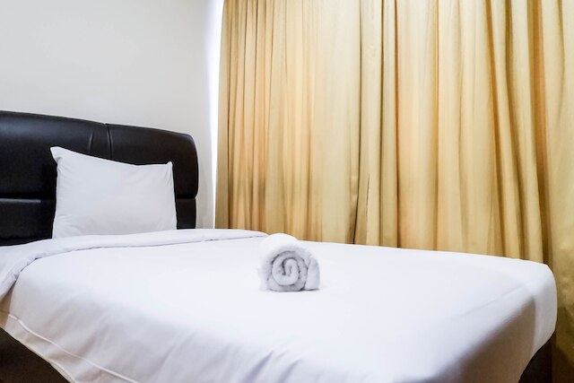 タマン ベバリー アパートメントにある広々とした高層階のベッドルーム 2 室