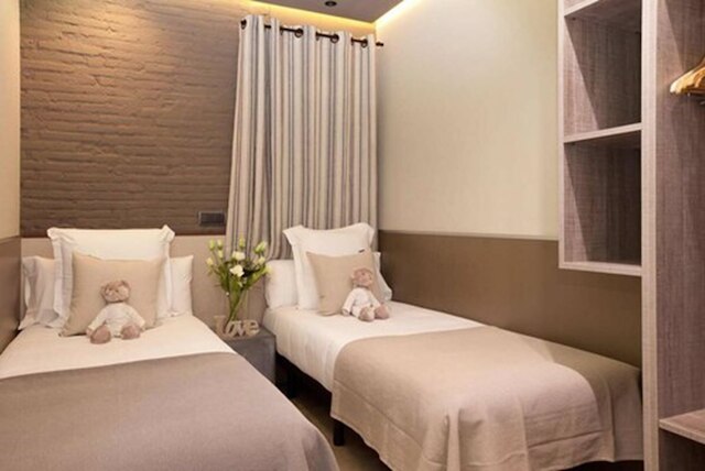 エンジョイ ミロ アパートメンツ