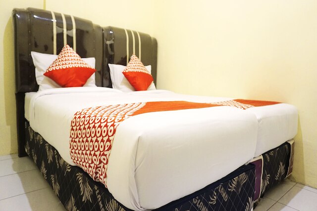 ホテル O ペカンバル ニア モール チプトラ セラヤ フォーマリー ロータス イン