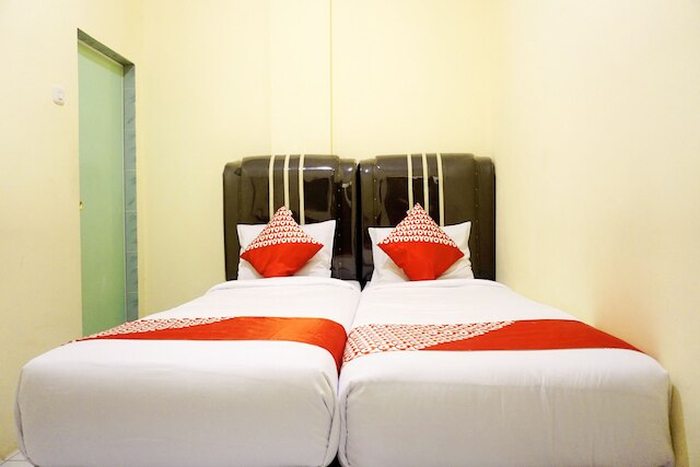 ホテル O ペカンバル ニア モール チプトラ セラヤ フォーマリー ロータス イン