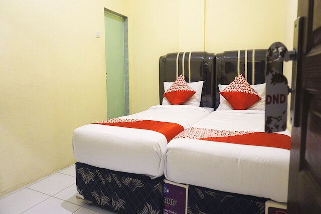 ホテル O ペカンバル ニア モール チプトラ セラヤ フォーマリー ロータス イン