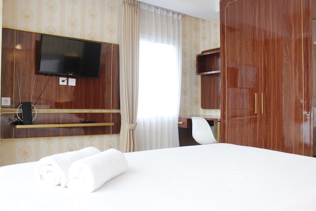 ザ グリーン コサンビ バンドン アパートメントにあるデラックスなベッドルーム 2 室