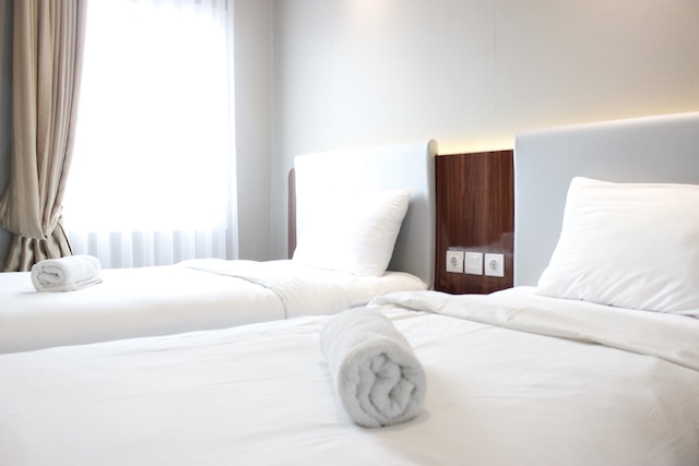 ザ グリーン コサンビ バンドン アパートメントにあるデラックスなベッドルーム 2 室