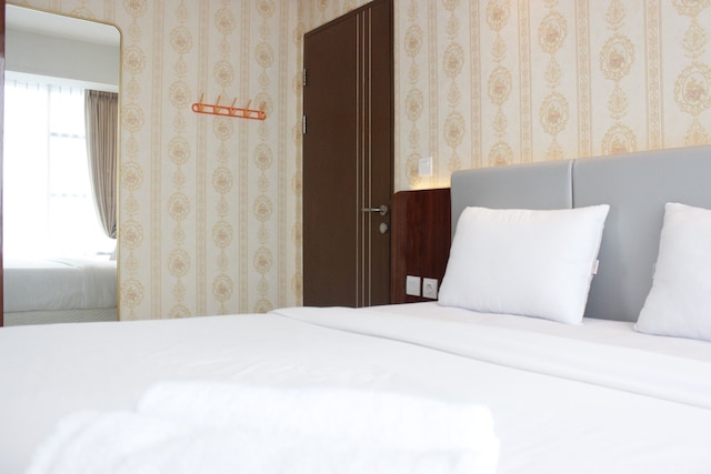 ザ グリーン コサンビ バンドン アパートメントにあるデラックスなベッドルーム 2 室