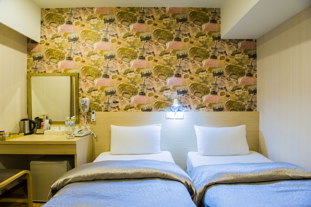 サンドゥオ ホテル (高雄三多商務旅店)