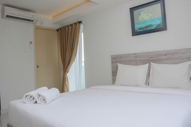 コンフィ アンド ミニマリスト スタジオ アット アメジスト アパートメント