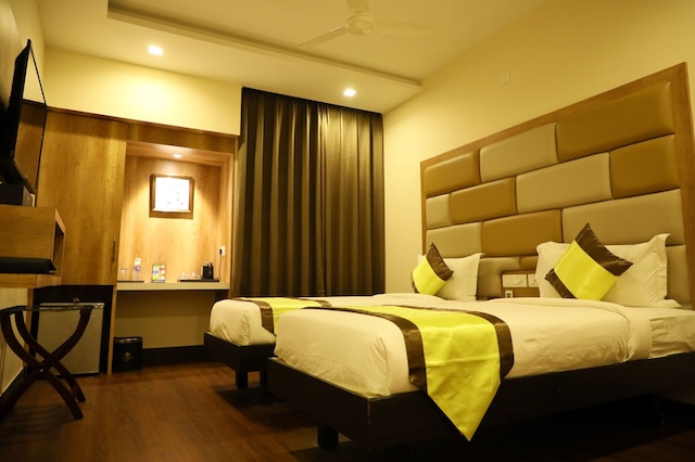 タズ カマル イン