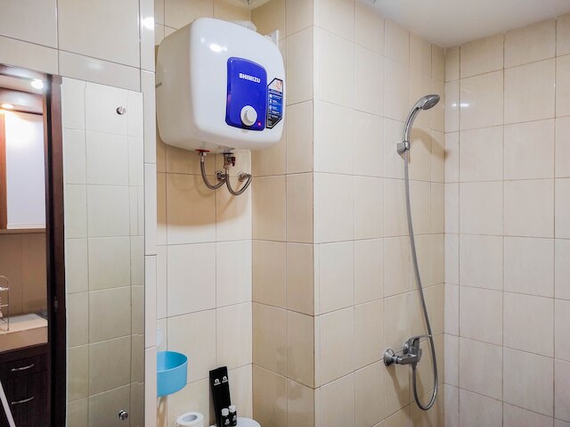 ホーミー アンド コンフィー スタジオ アット ヴィダ ビュー マカサル アパートメント