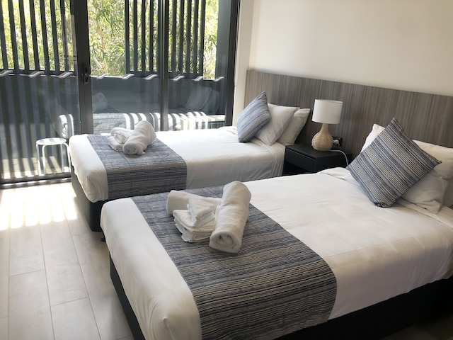 クージー スタジオ アパートメンツ