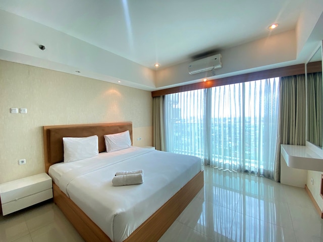 デラックス スタジオ ルーム アット タマンサリ ラ グランド アパートメント