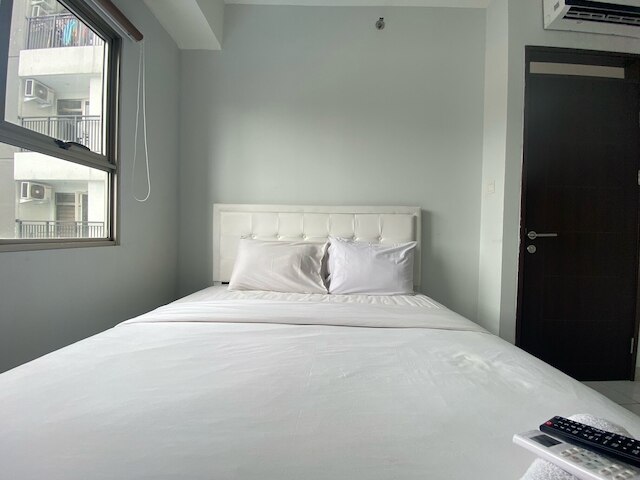 ブライト アンド リラクシング ベッドRム アット メカルワンギ スクエア バンドン