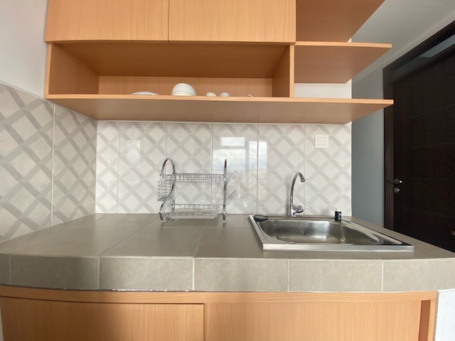 ブライト アンド リラクシング ベッドRム アット メカルワンギ スクエア バンドン