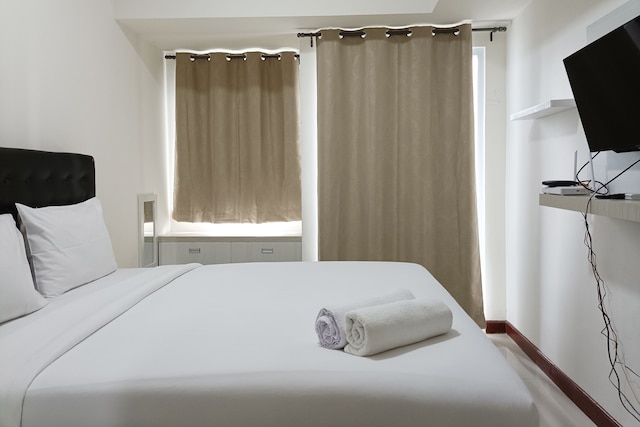 ホーミー アンド タィディ スタジオ アパートメント アット ヴィダ ビュー マカッサル