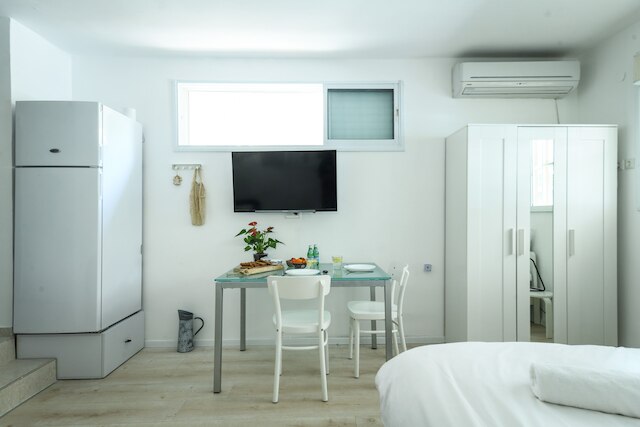 活気のある近隣のコージースタジオアパート