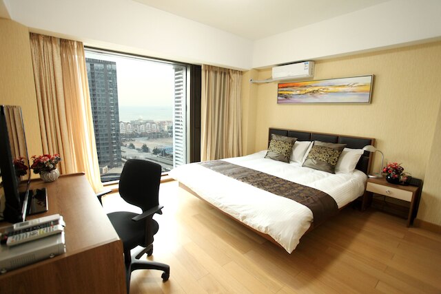 レー ジア シュアン インターナショナル コンベンション センター ブランチ (乐家轩精品酒店服务公寓 青岛会展中心海水浴场店)