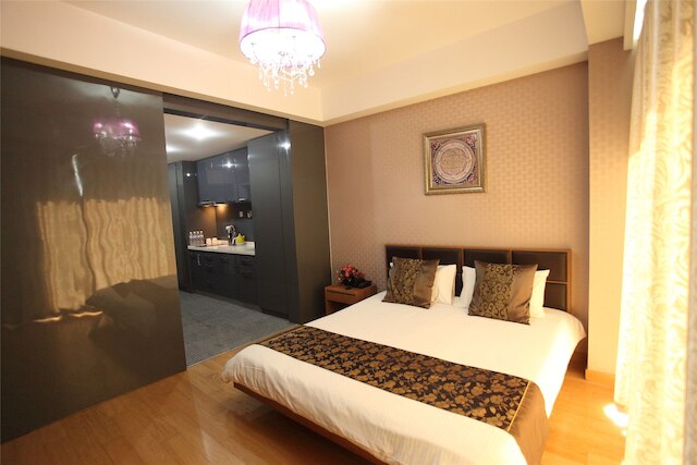 レー ジア シュアン インターナショナル コンベンション センター ブランチ (乐家轩精品酒店服务公寓 青岛会展中心海水浴场店)