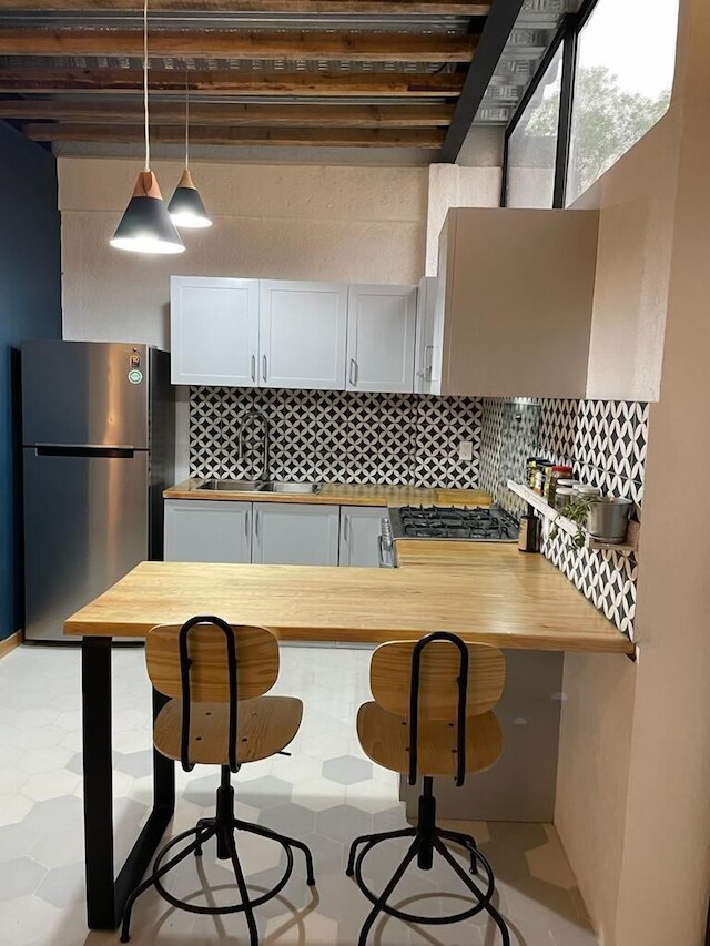 ミナ 32 - コヨアカン