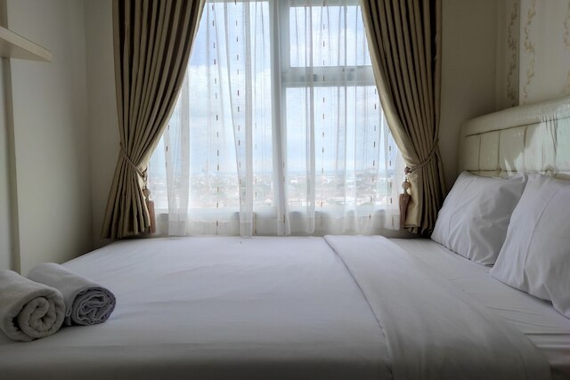 シンプリー アンド クリーン 2ベッドルーム アパートメント  アット ヴィダ ビュー マカッサル