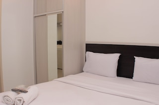 コージー リビング スタジオ アット アーバンタウン  アパートメント  カラワン