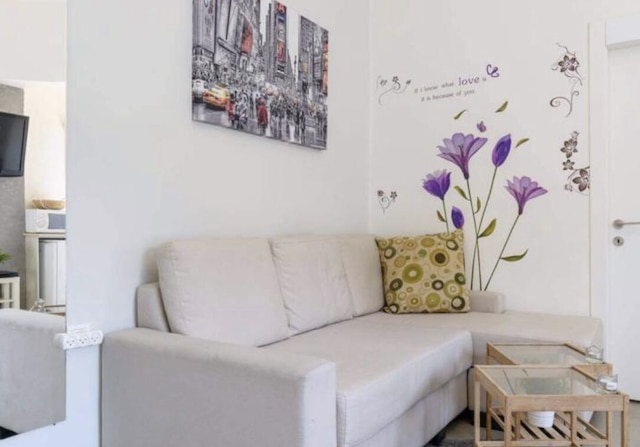 バルコニーと駐車場付きラグジュアリースタジオ