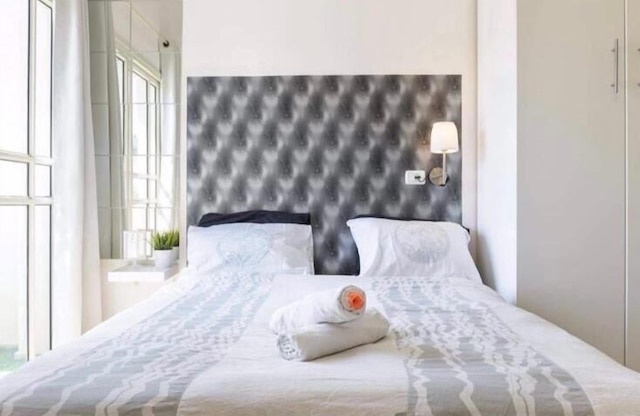 バルコニーと駐車場付きラグジュアリースタジオ