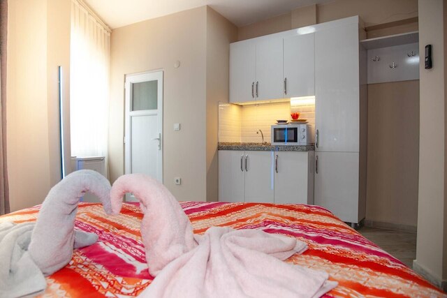 アザド・ホームズ・クムカピ54